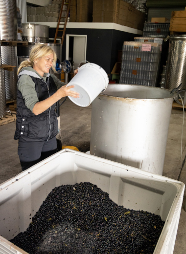 Lana in the process of making wine